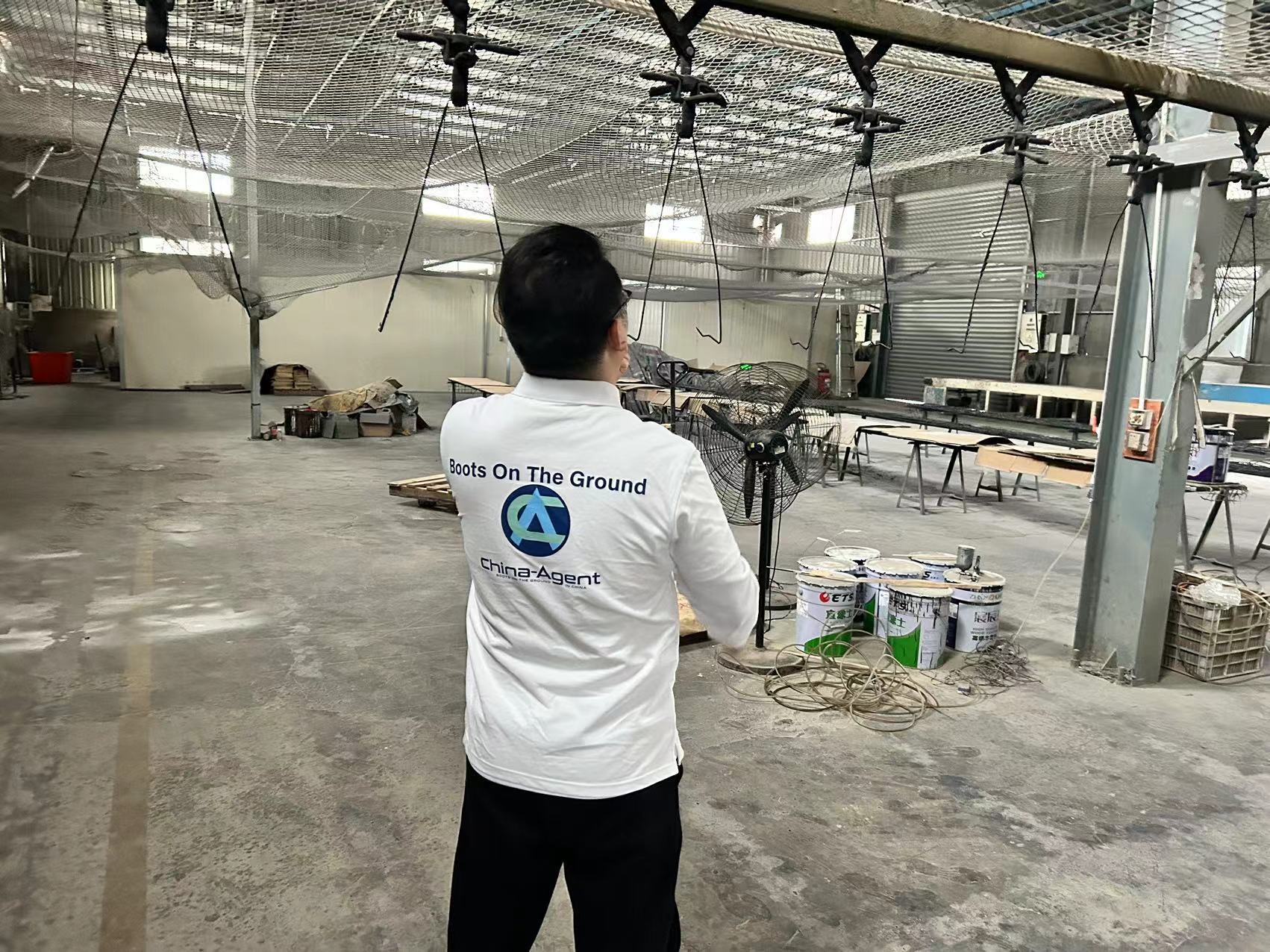 China Agent team member on a factory floor — Boots On The Ground
